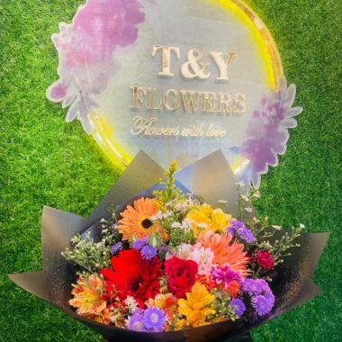 Black Wrapped Vivid Garden Bouquet